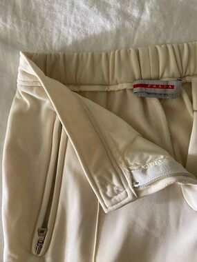 Stunning rare Vintage Prada crème straight leg track pants with piping, size 0